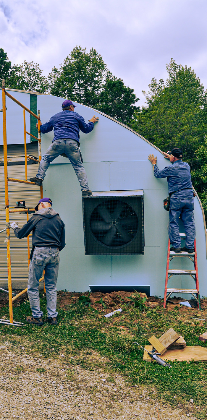 Men Installing Panels
